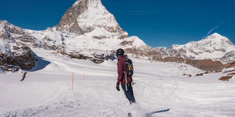 Having fun on a solo snowboard trip