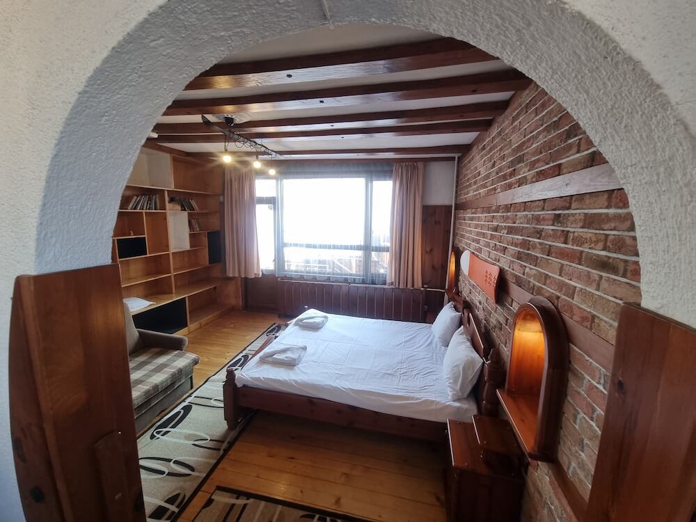 A bedroom at Explore Bansko Chalets